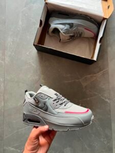 wolf grey low-top sneakers with black detailing and pink-red accents