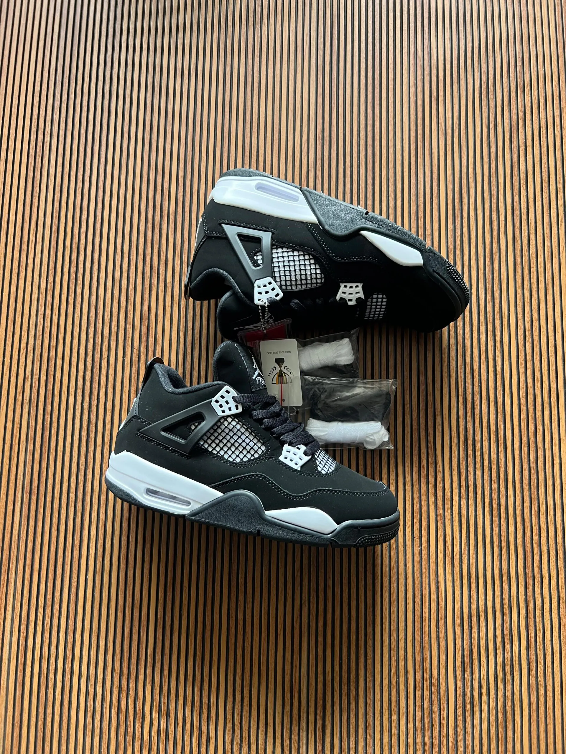 Black and White Thunder Retro 4 Sneakers For Boys (2) Black and White Thunder Retro 4 Sneakers For Boys (2)