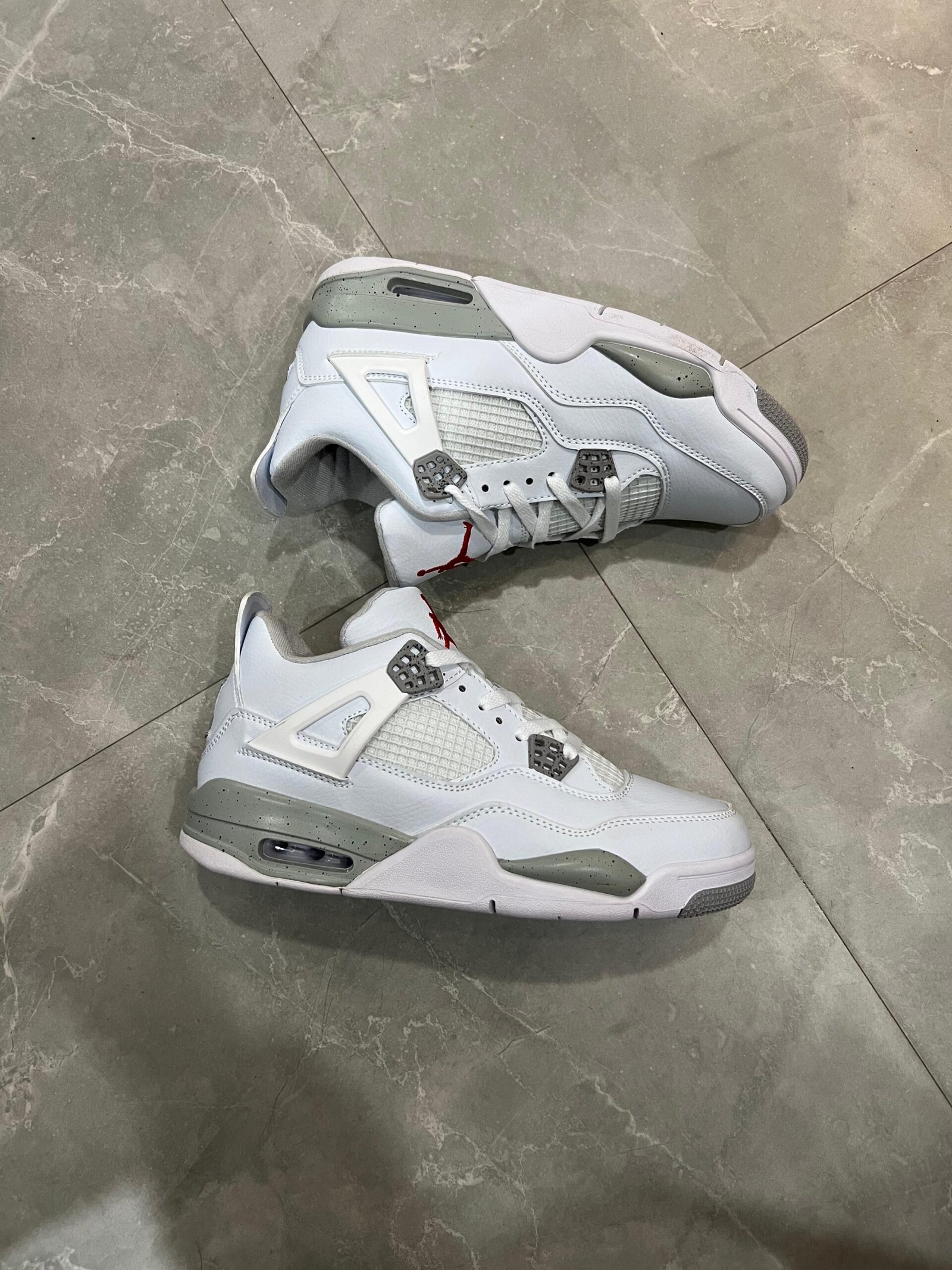 White Oreo Cement Retro 4 Sneakers – Classic Basketball Style White Oreo Cement Retro 4 Sneakers – Classic Basketball Style