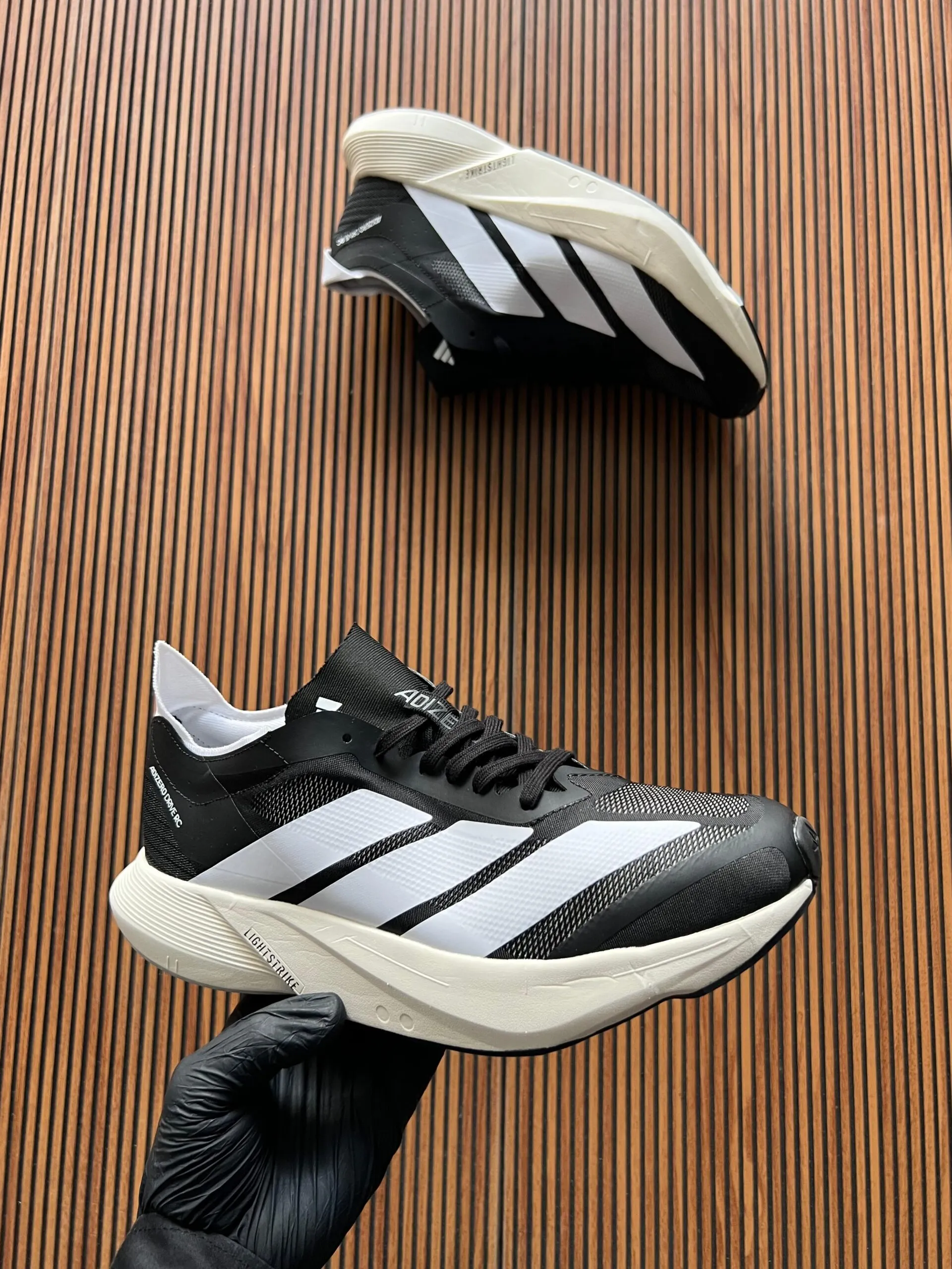 Adizero Drive RC Premium Sneakers – Lightweight & Durable