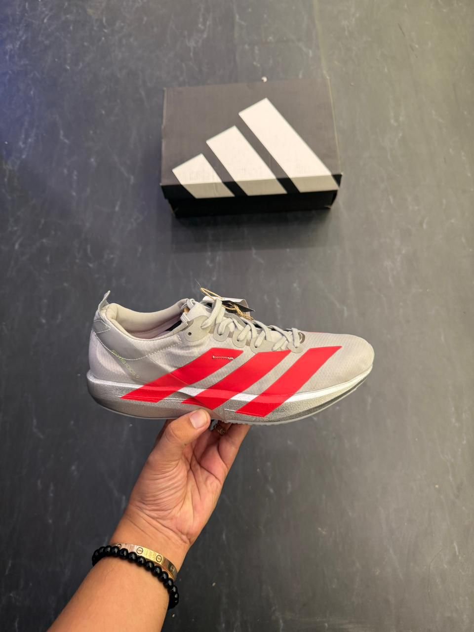 Grey Red Adizero Adios 9 Running Sneakers (2) Grey Red Adizero Adios 9 Running Sneakers – Boys' Performance Shoes