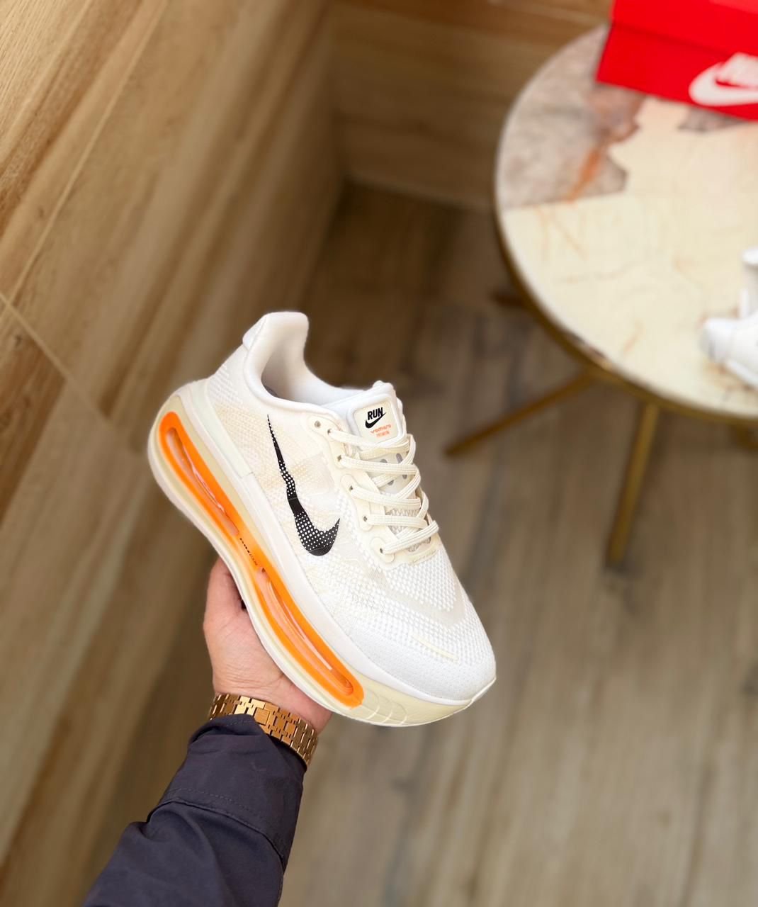 Vomero Premium Boys’ Sneakers in White with Orange Accents (1)