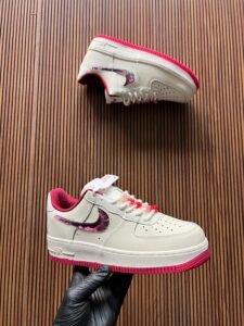 White Low-Top Air Force 1 Sneakers – Girls’ Stylish Shoes with Pink Accents (1)
