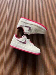 White Low-Top Air Force 1 Sneakers – Girls’ Stylish Shoes with Pink Accents (2)