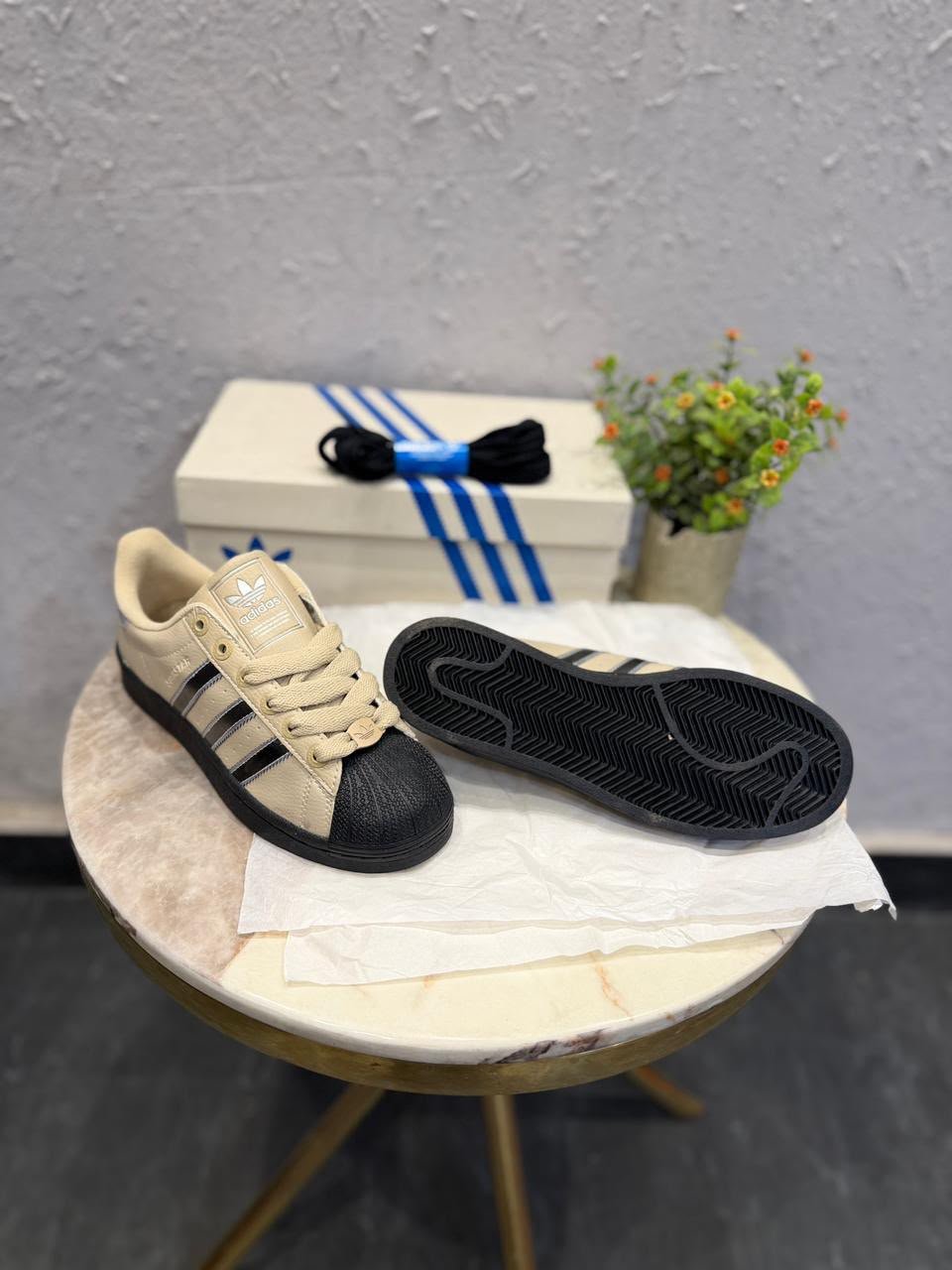 Beige Black Silver Classic Shell-Toe Sneakers – Retro Streetwear Edition (4) Beige black and silver shell-toe sneakers with metallic side stripes and black outsole