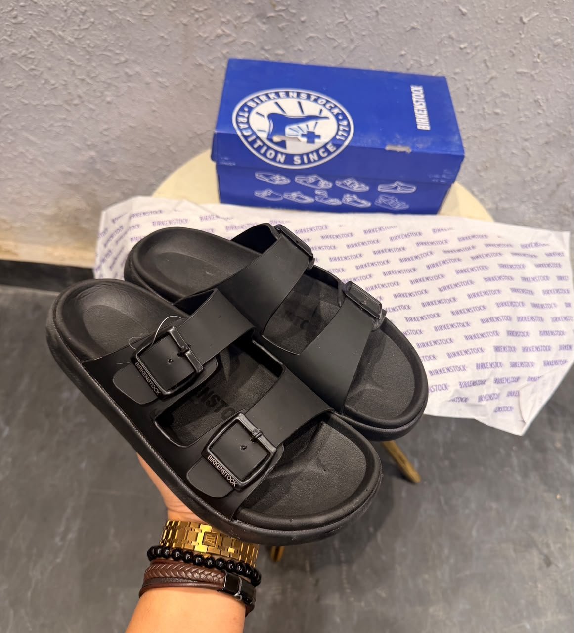 Black Double-Buckle Comfort Slides for Men – Minimalist Casual Sandals (1) Black double-buckle slides for men with a contoured footbed and minimalist slip-on design