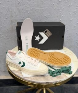 One Star Player 76 retro low-top sneakers in black, brown, and white green colourways with star emblems and contrasting soles