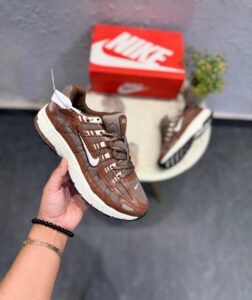 Brown and white P-6000 running-inspired sneakers with layered mesh-style panels and a cream-coloured sole