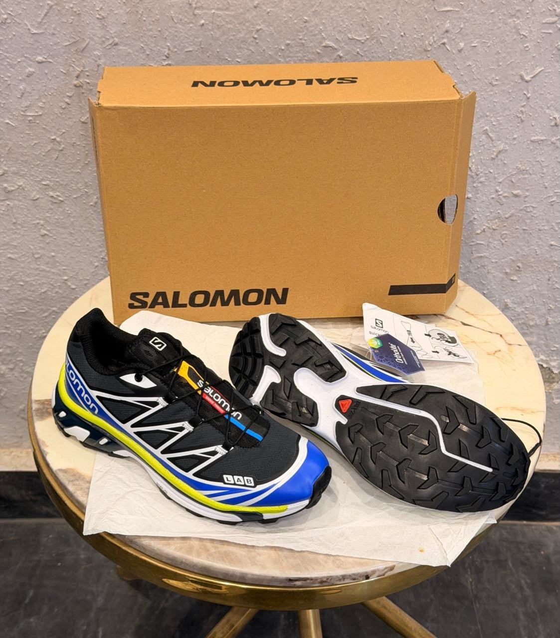 XT Ghost Waterproof Trail Sneakers – Black, Blue & Neon Yellow (3) Black blue and neon yellow XT Ghost trail-inspired sneakers with geometric overlays and rugged tread outsole